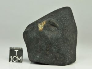 Chelyabinsk LL5 78g, fresh crusted specimen with small broken surface showing slightly weathered interior
