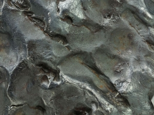 Sikhote Alin IIB 3kg, preserved fusion crust (close up)